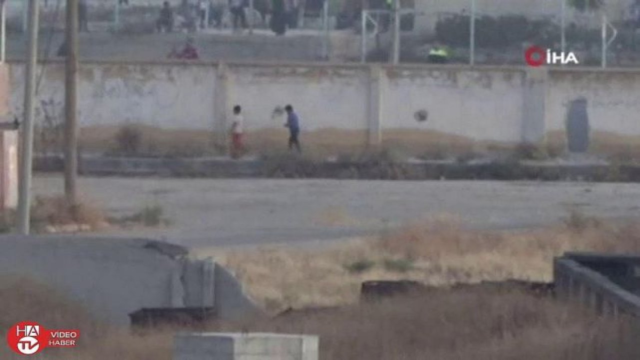 Teröristler gazetecileri görünce çocukları sıraya dizip yürüttü